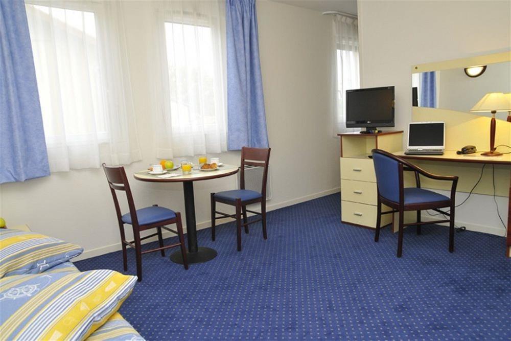 อัปปาร์ต ซิตี้ ลิมอฌ Aparthotel ลิมอจส์ ภายนอก รูปภาพ